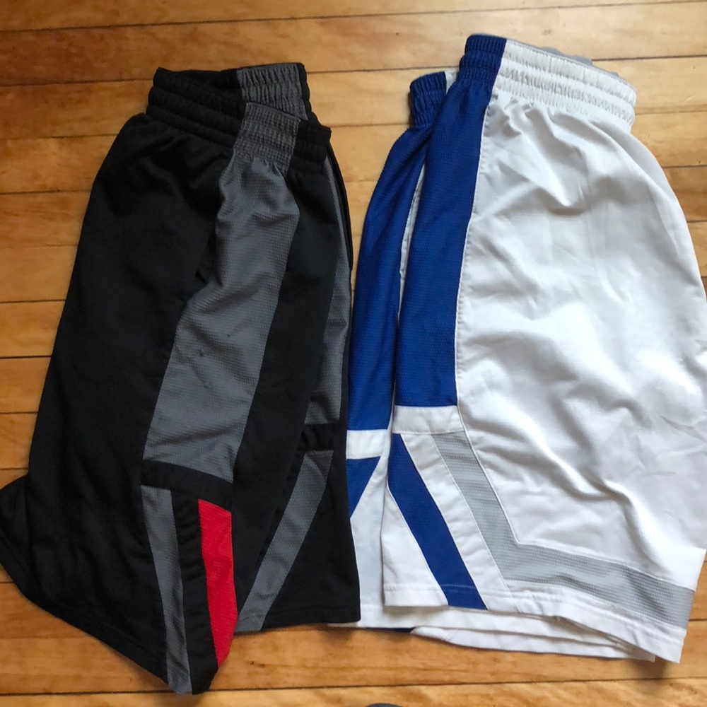 2 Large shorts. Black/red, white/blue.